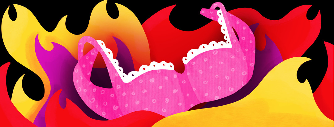 A bra emerges from colorful flames.