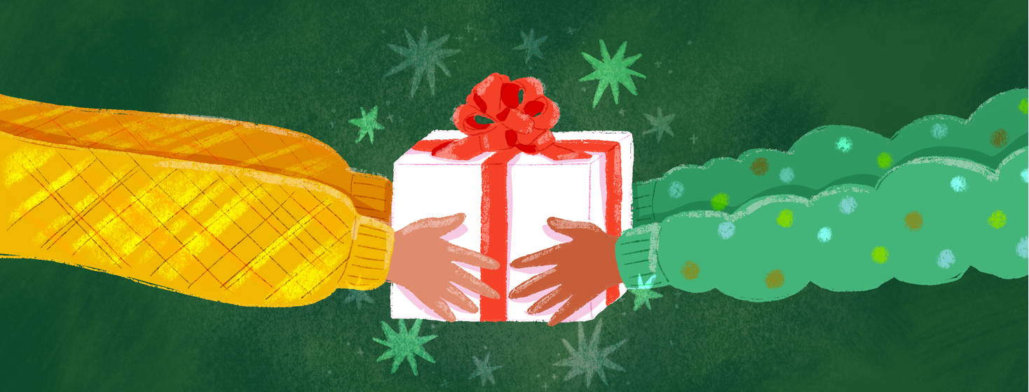 Two pairs of hands hold a gift.