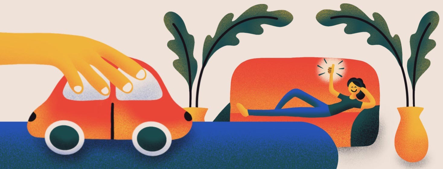 A child's hand plays with a toy car while the mom is sitting on the couch giving them an affirmation with thumbs up. Plants surround them.