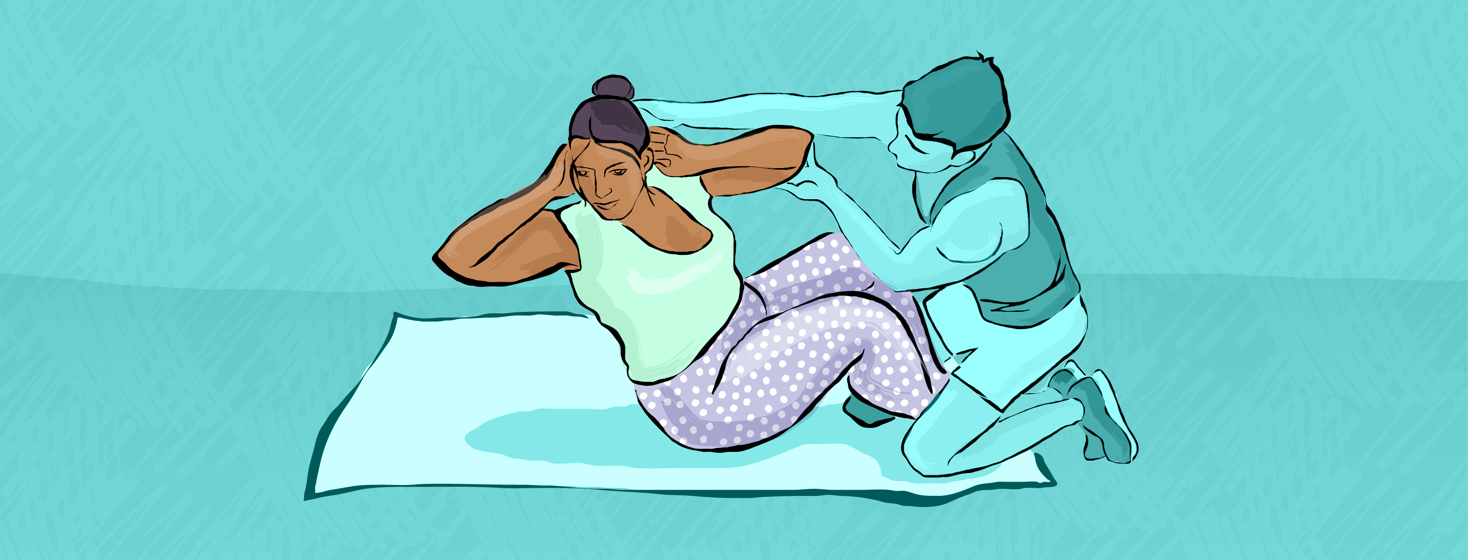 Adult female exercising with adult male helping her.