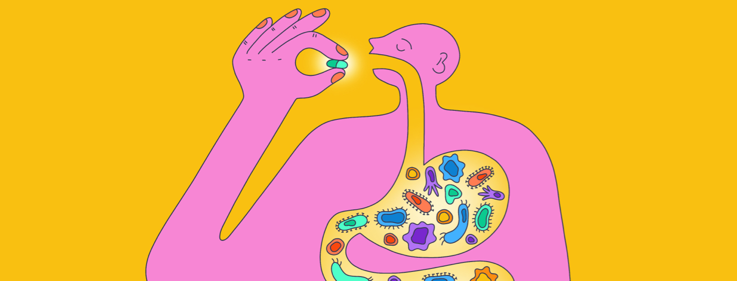 A person holds a pill up to their mouth with their gut biome in their stomach visible.