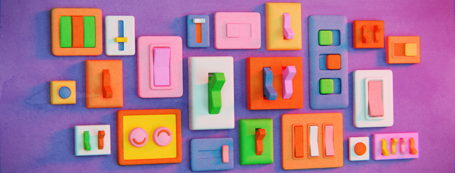 A wall full of brightly colored light switches