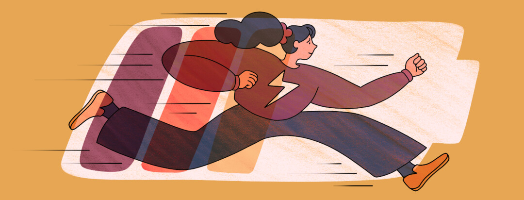 A woman with a lightning bolt symbol on her sweater runs as a battery behind her runs out of energy.